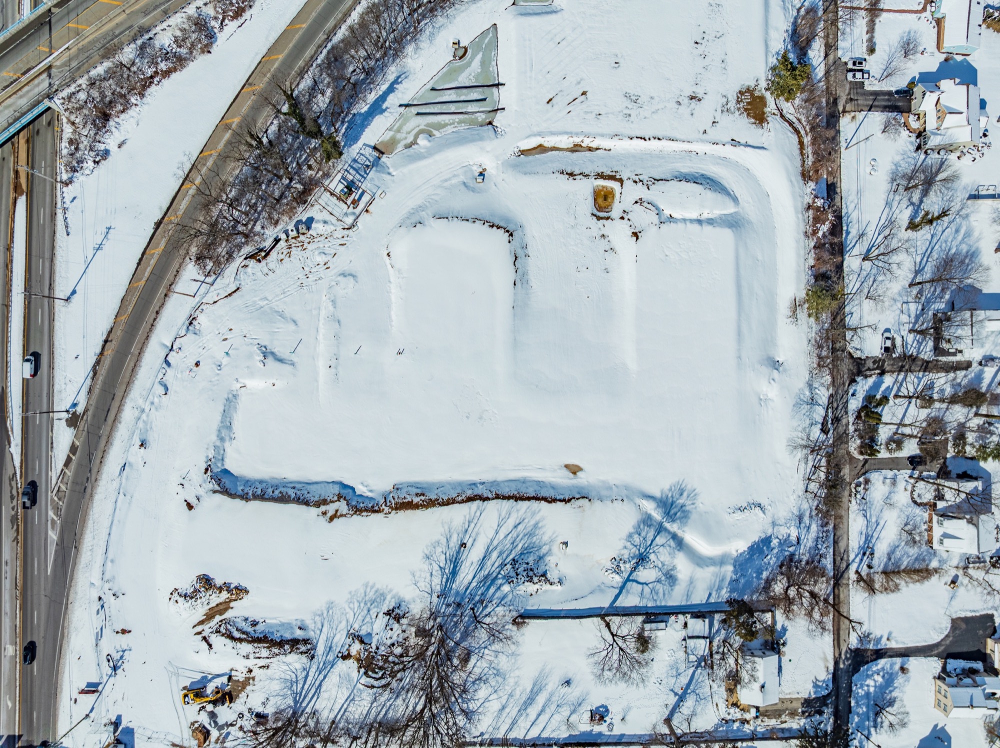Top-down winter view of the 943 High Street site