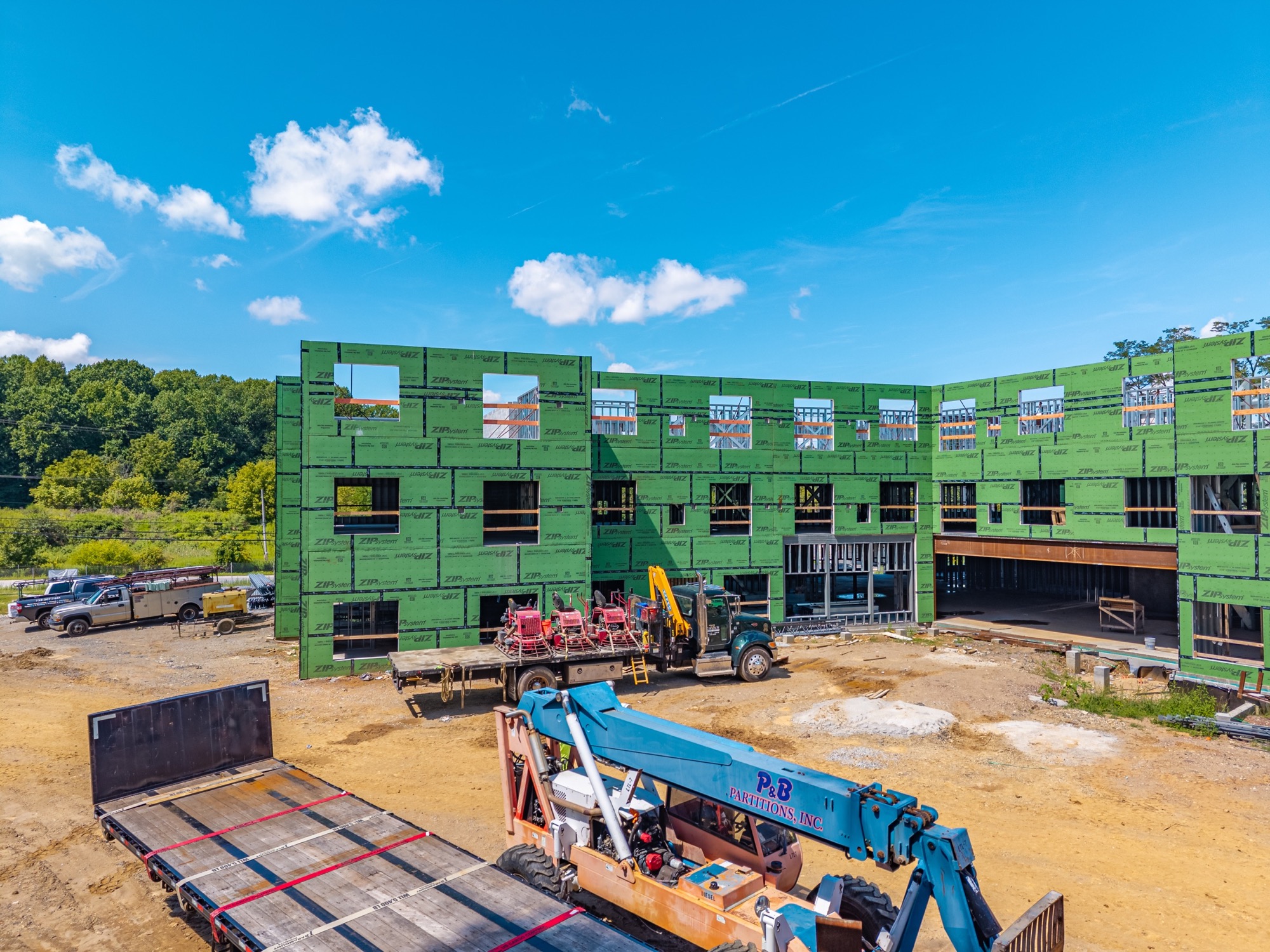 Ground-level view of green exterior sheathing at High Street
