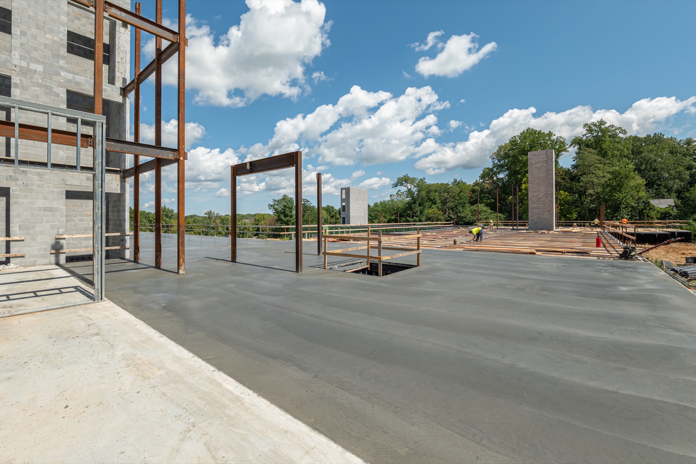 Newly poured floor slab and steel framing