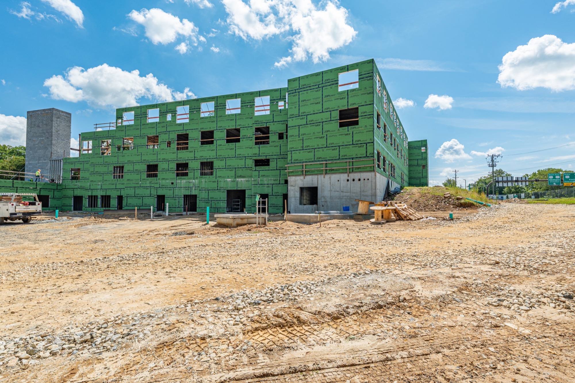 Wide ground view across the active High Street site
